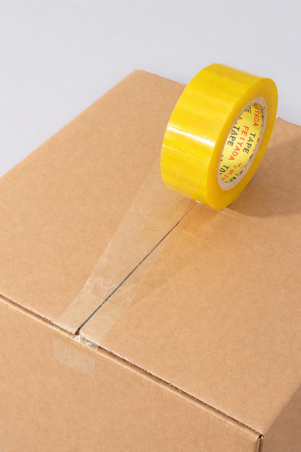 Packaging tape applied to carton for secure sealing